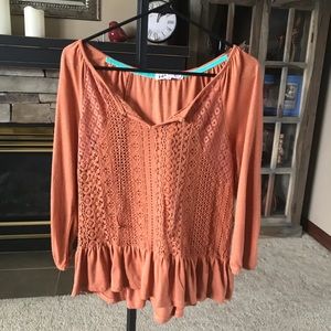 Adorable blouse with fun laced fabric on front